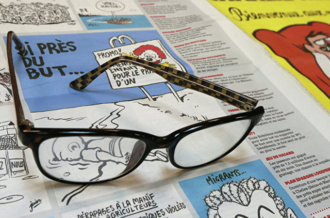 Charlie Hebdo зробив карикатуру на відкриття православного собору в Парижі