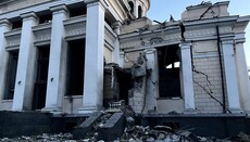 People praying in Odesa's Transfiguration Cathedral during missile strike