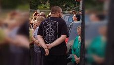 People with satanic symbols on clothes storm temple in vlg. Dovzhok