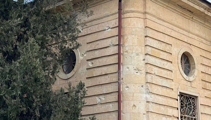 Shrapnel marks on the wall of St Catherine's Cathedral in Kherson. Photo: pravoslavie.ks.ua