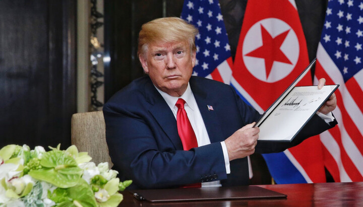 Trump signing an executive order on gender policy. Photo: PBS