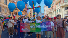LGBT Catholics march in Rome with rainbow cross